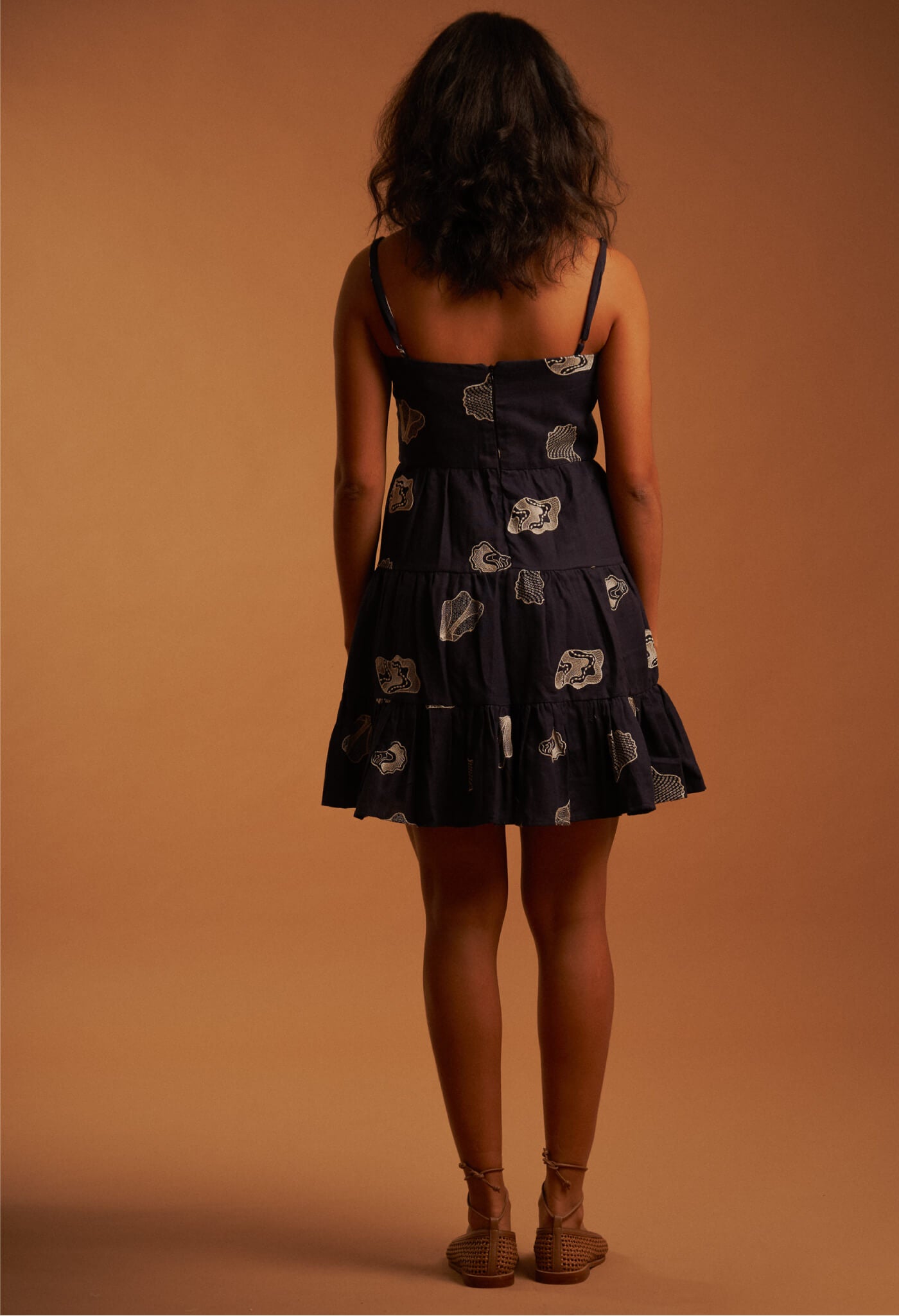 concealed zip fastening along the back sleek square neckline